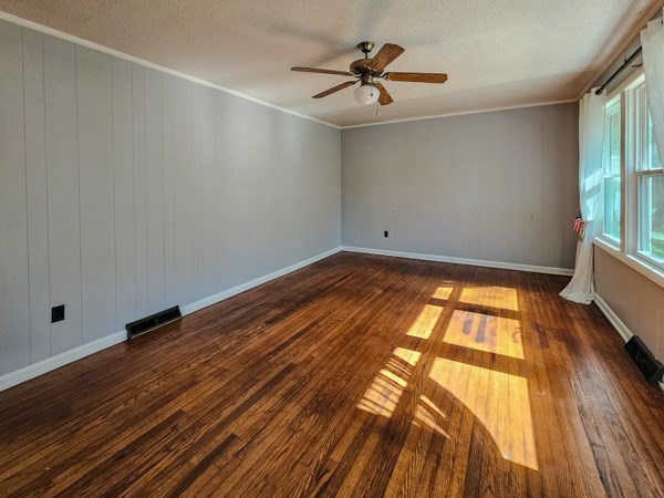 265 Tyler Road Ellijay, GA 30540 - Photo 19 of 43 a view of empty room with wooden floor and fan