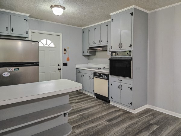 265 Tyler Road Ellijay, GA 30540 - Photo 23 of 43 a kitchen with cabinets appliances and a counter space