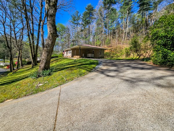 265 Tyler Road Ellijay, GA 30540 - Photo 43 of 43 a front view of a house with a yard
