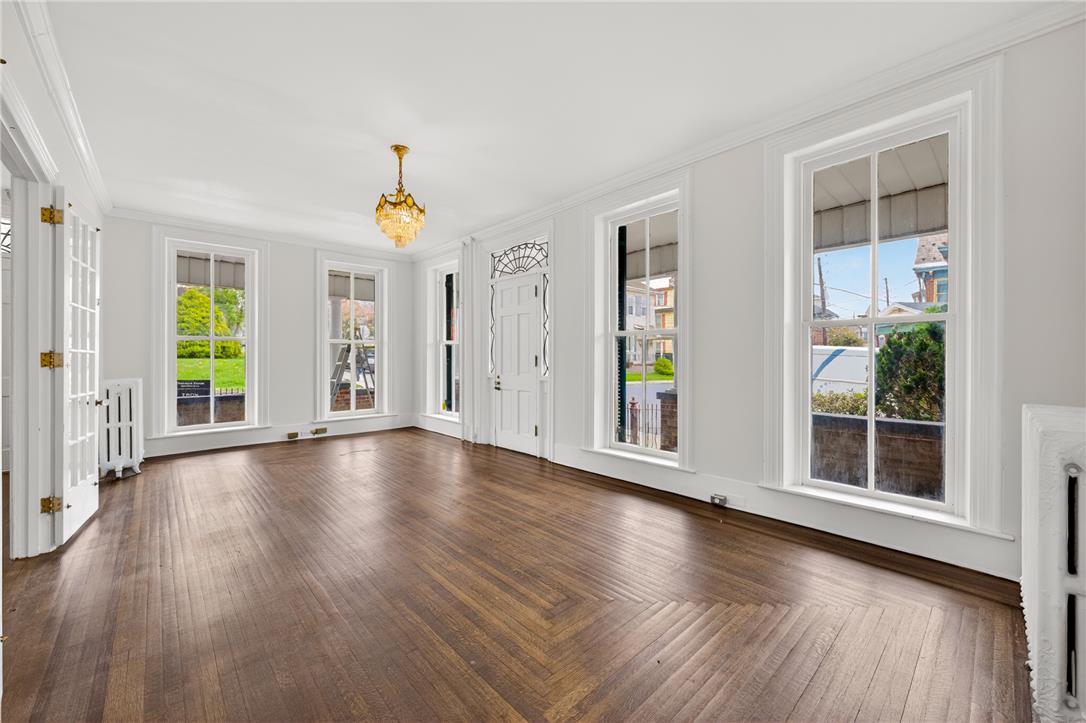 65 2nd Street Slatington, PA 18080 - Photo 11 of 46 This airy room features rich hardwood flooring and large windows, perfect for showcasing your unique style.