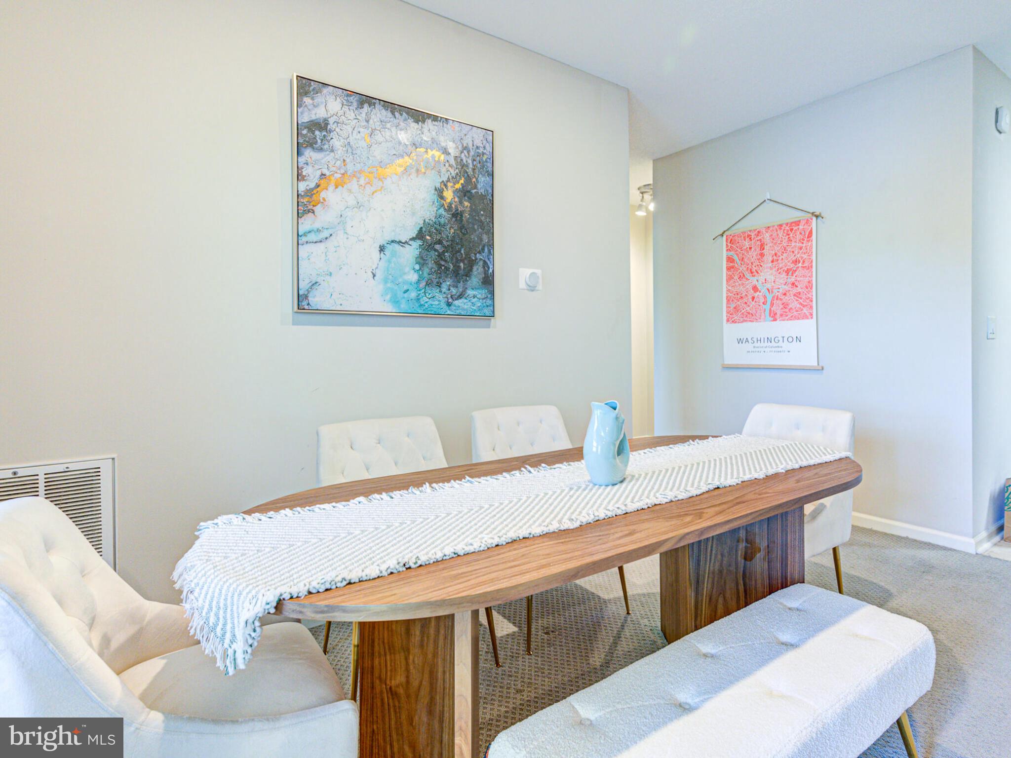 1720 Lake Shore Crest Drive, Unit 35 Reston, VA 20190 - Photo 16 of 41 a view of a dining room with furniture