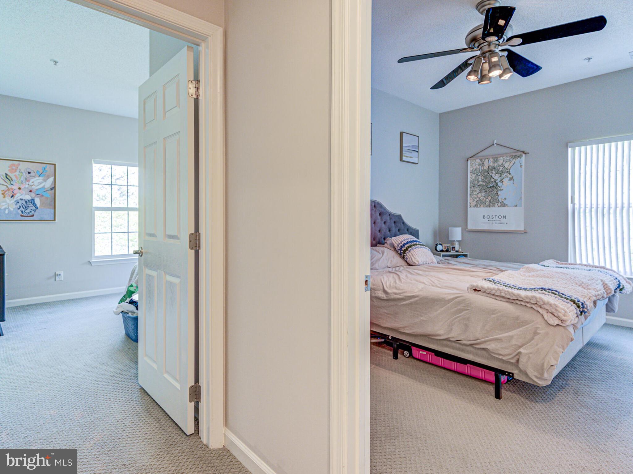1720 Lake Shore Crest Drive, Unit 35 Reston, VA 20190 - Photo 33 of 41 a bedroom with a bed and a window