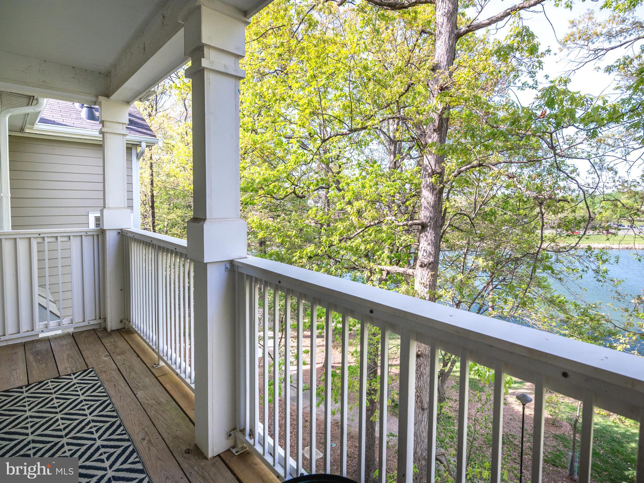 1720 Lake Shore Crest Drive, Unit 35 Reston, VA 20190 - Photo 36 of 41 a view of a balcony with wooden floor