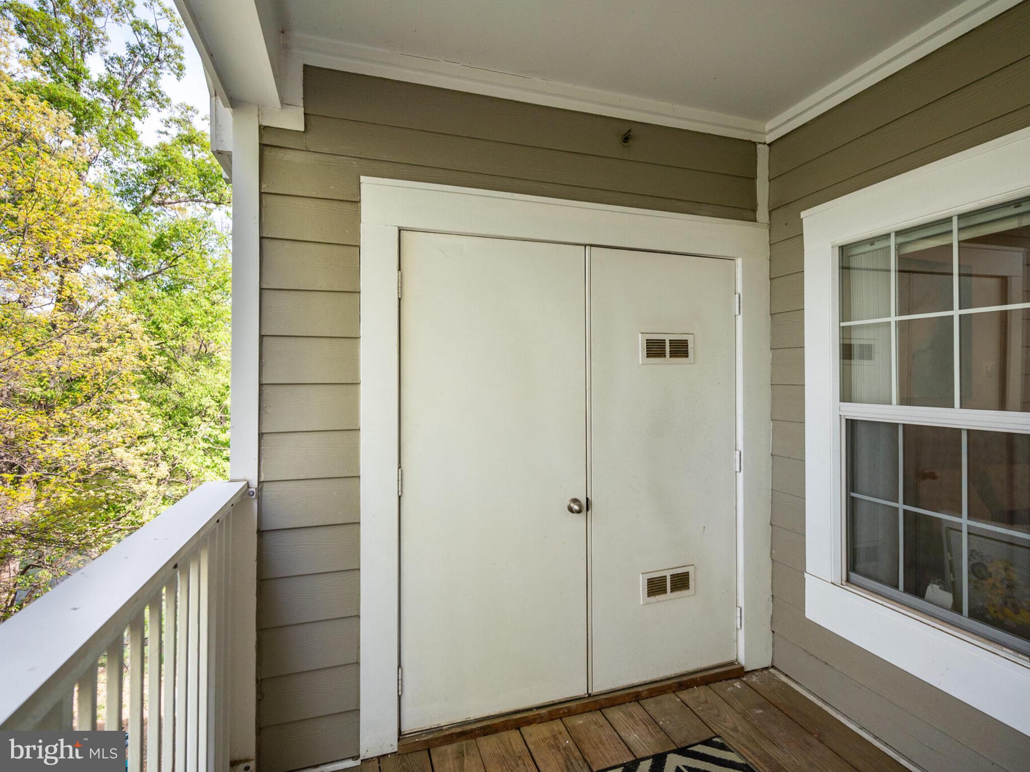 1720 Lake Shore Crest Drive, Unit 35 Reston, VA 20190 - Photo 38 of 41 a view of front door and porch