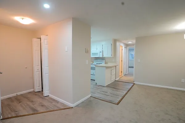 a view of kitchen with wooden floor
