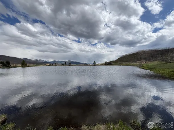 a view of a lake from a yard