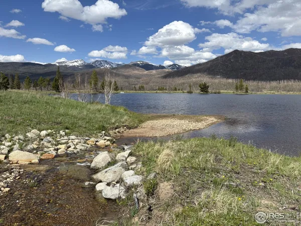 a view of a lake with a mountain