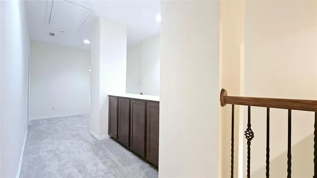 a view of a hallway with entryway