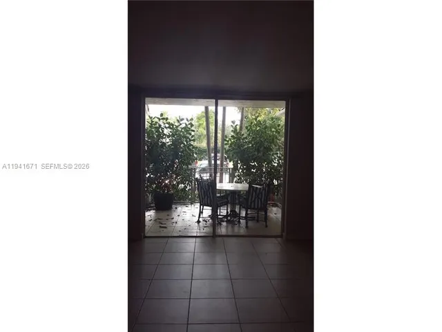 a black and white photo of a living room