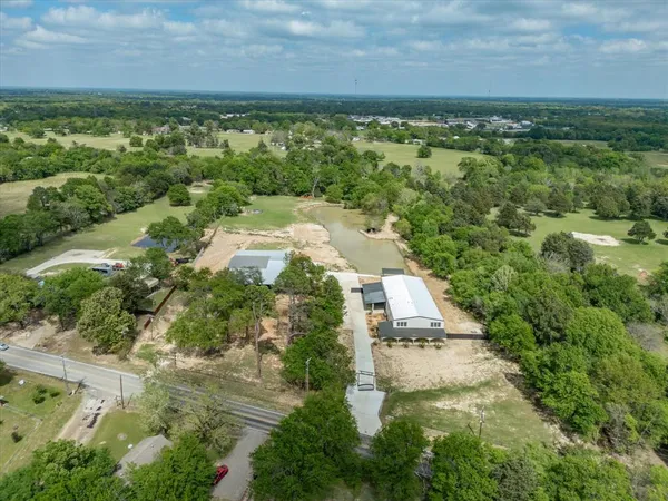 a view of lake with green space
