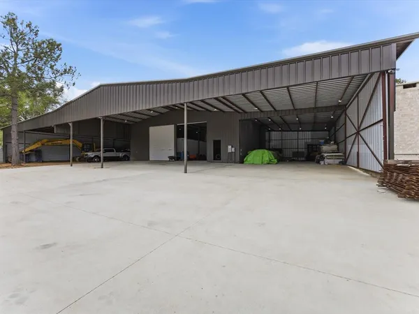 a view of a room with wooden walls