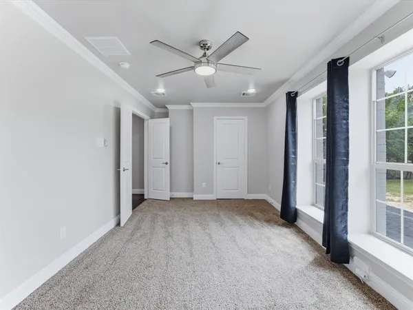 a kitchen with granite countertop a sink and a stove top oven