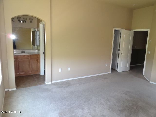 2727 North Price Road, Unit 86 Chandler, AZ 85224 - Photo 22 of 27 023-253349_MASTER_BEDROOM