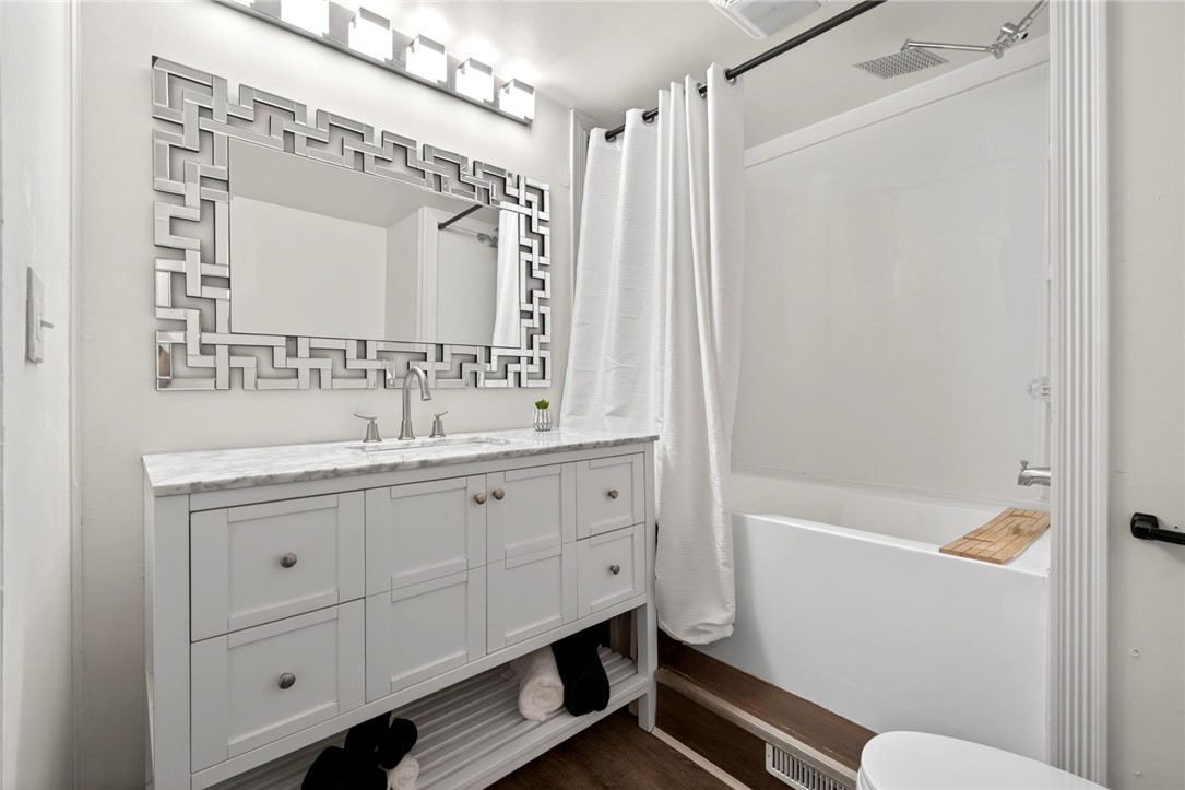 2684 Arthur Road Springfield, OH 45502 - Photo 31 of 69 This clean bathroom offers a contemporary vanity and a bright, functional bathing area.