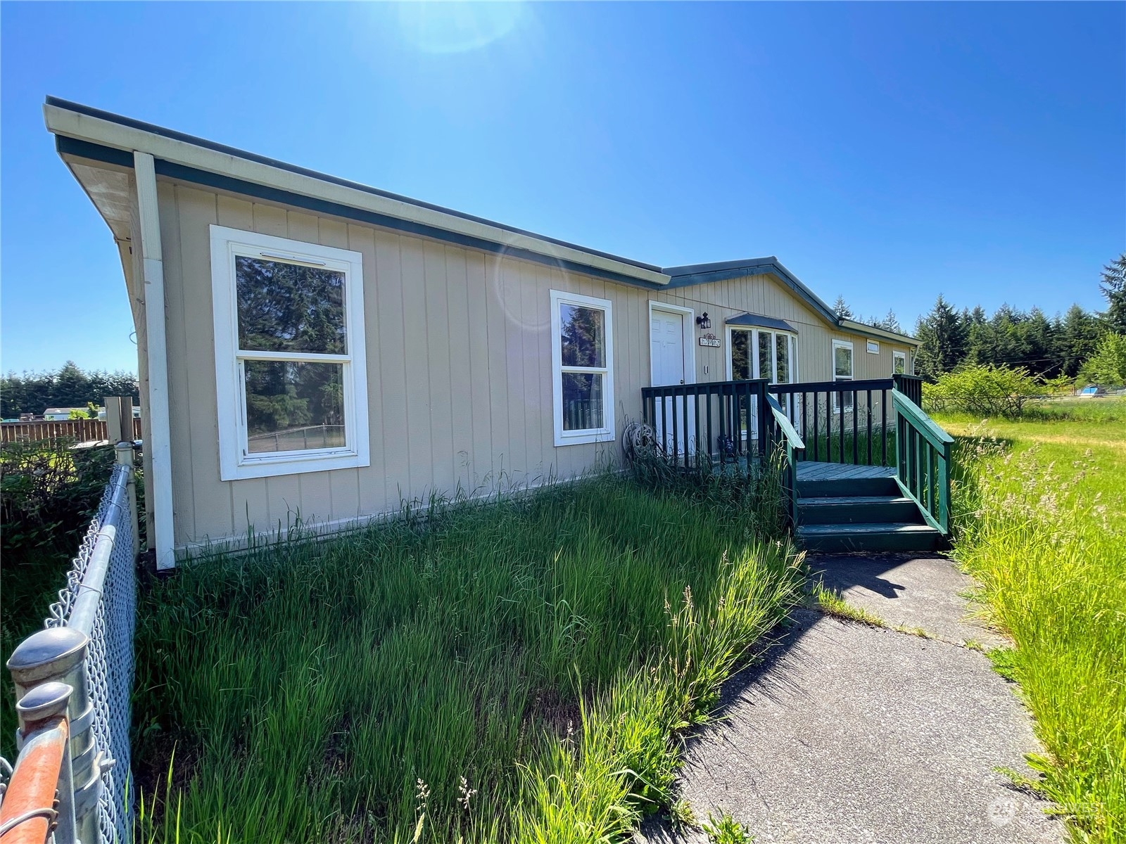 17902 Michelles Lane Southwest Rochester, WA 98579 - Photo 1 of 25 a view of a house with a yard