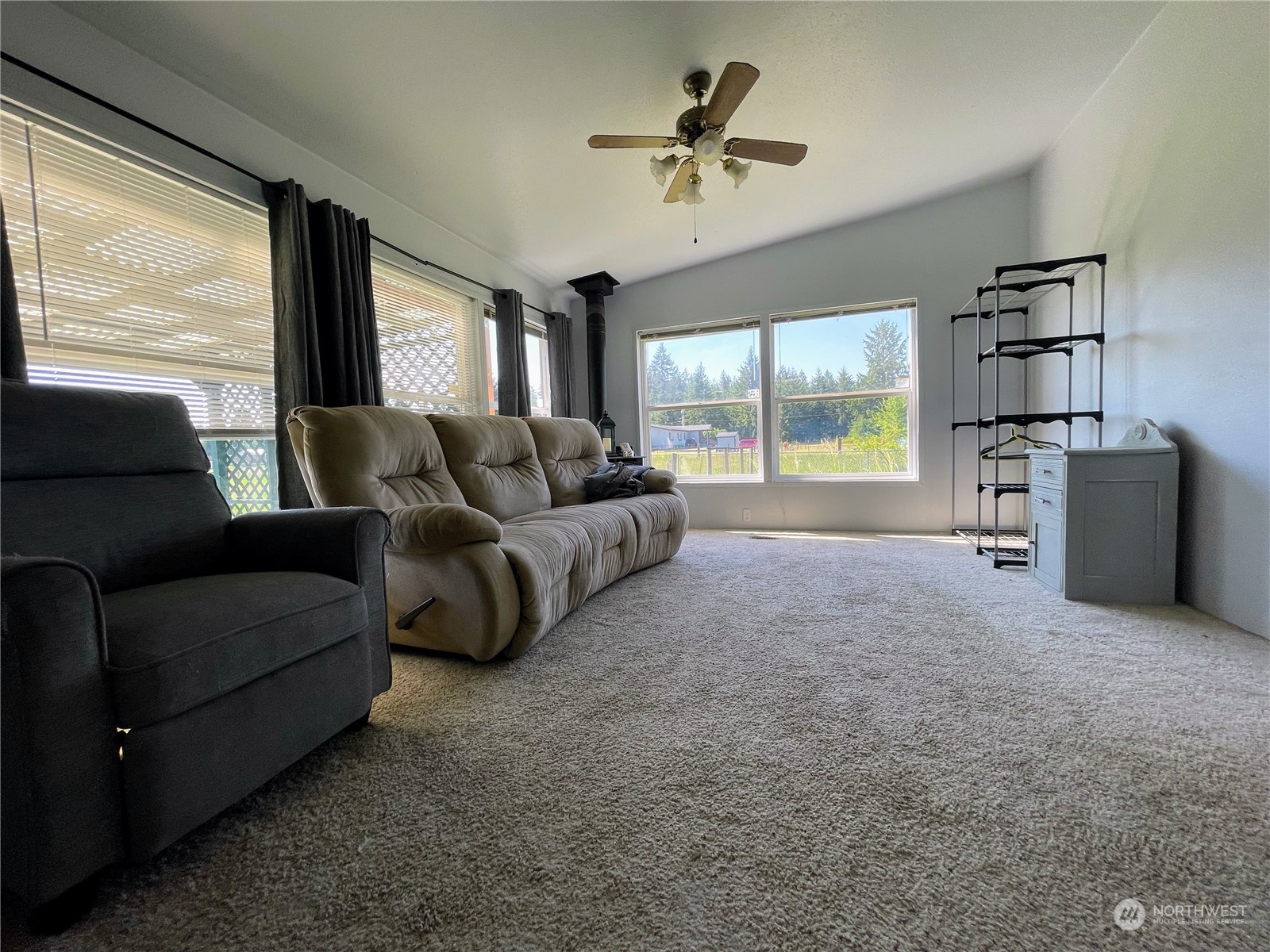 17902 Michelles Lane Southwest Rochester, WA 98579 - Photo 14 of 25 a living room with furniture and a large window