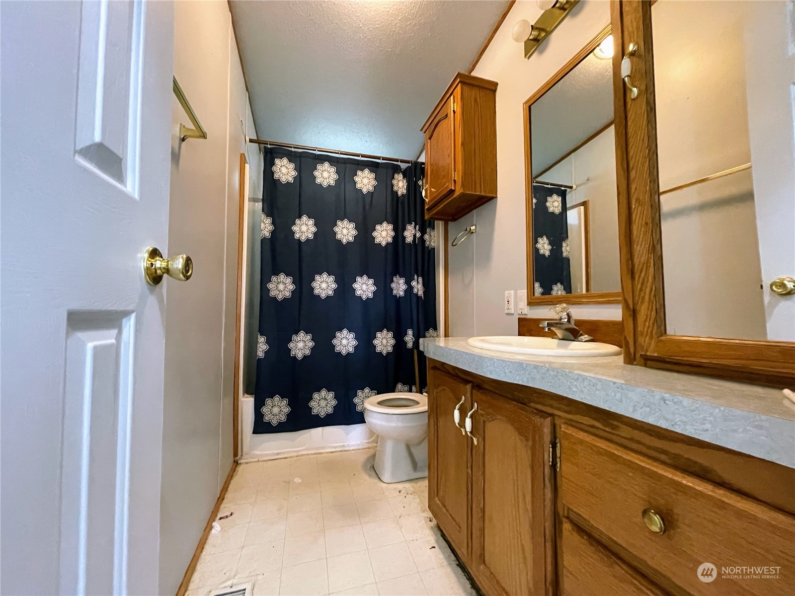 17902 Michelles Lane Southwest Rochester, WA 98579 - Photo 15 of 25 a bathroom with a sink a toilet and shower