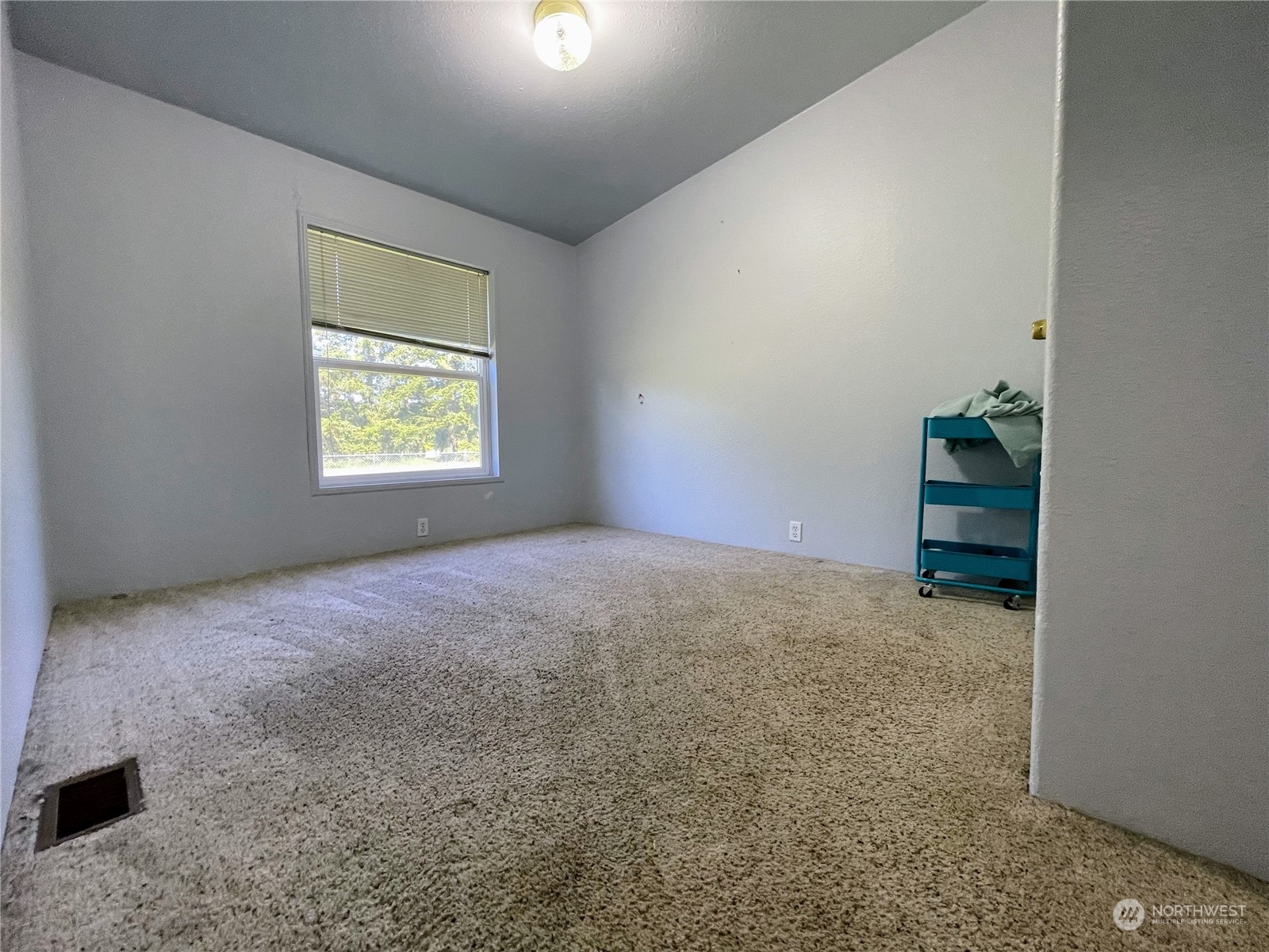 17902 Michelles Lane Southwest Rochester, WA 98579 - Photo 16 of 25 an empty room with windows