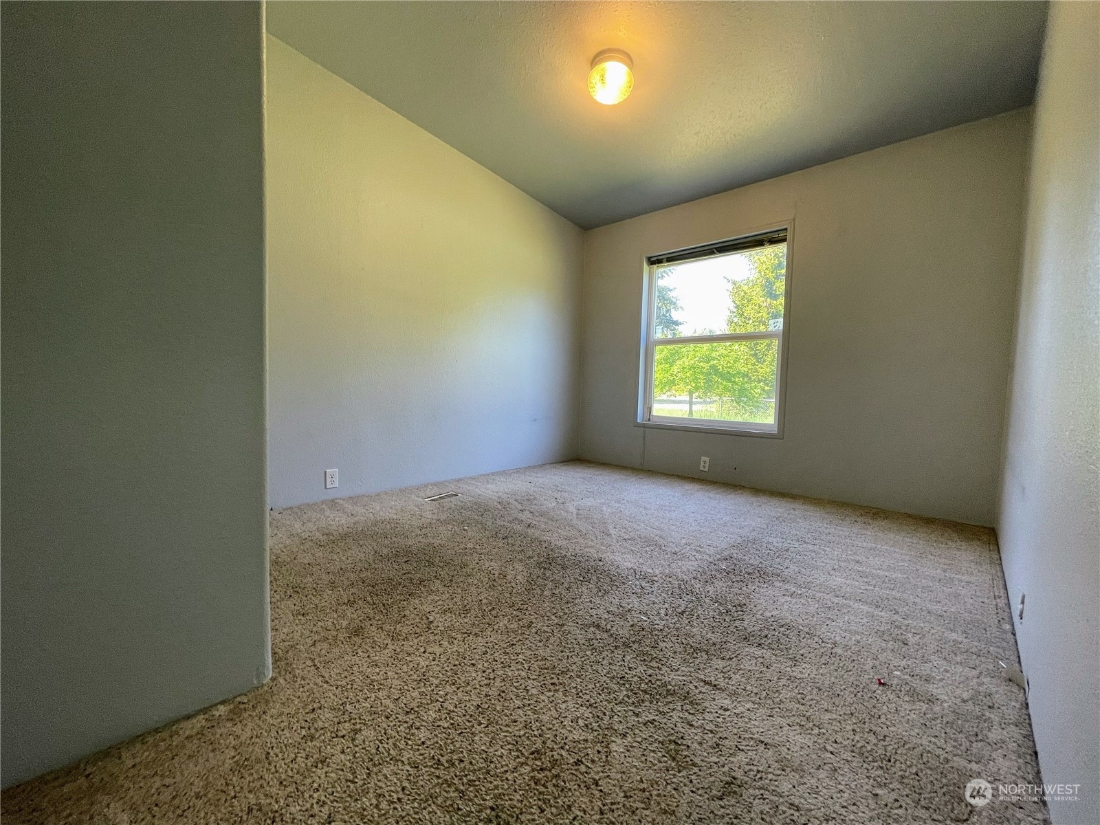 17902 Michelles Lane Southwest Rochester, WA 98579 - Photo 17 of 25 an empty room with windows