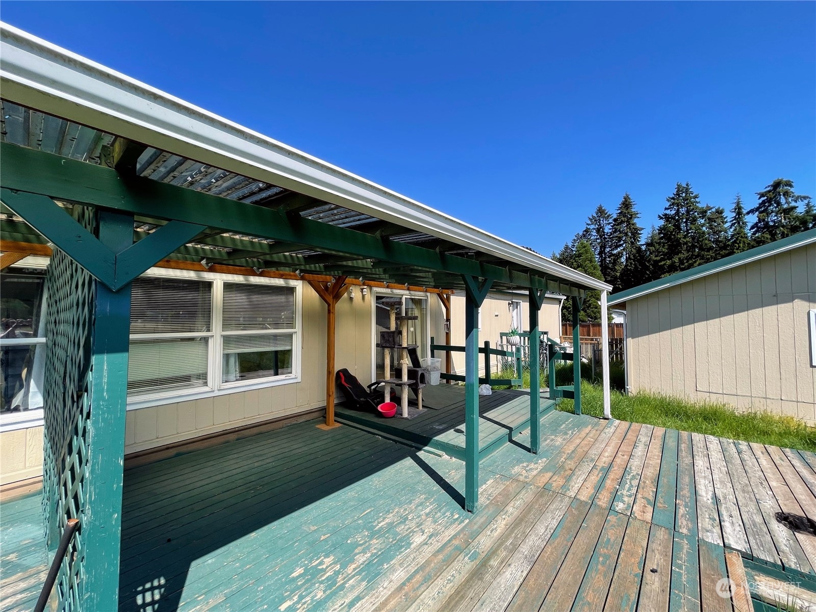 17902 Michelles Lane Southwest Rochester, WA 98579 - Photo 18 of 25 a view of a house with backyard and sitting area