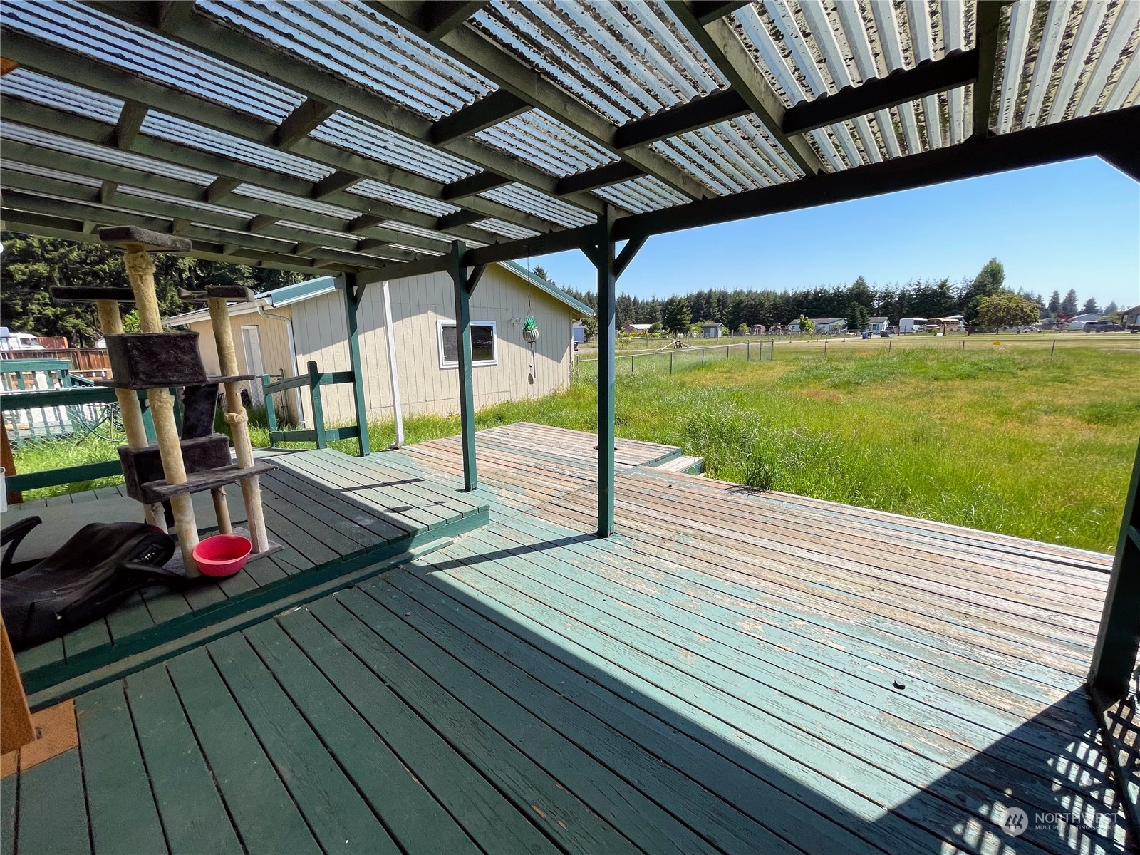 17902 Michelles Lane Southwest Rochester, WA 98579 - Photo 20 of 25 a view of a deck with wooden floor and outer view