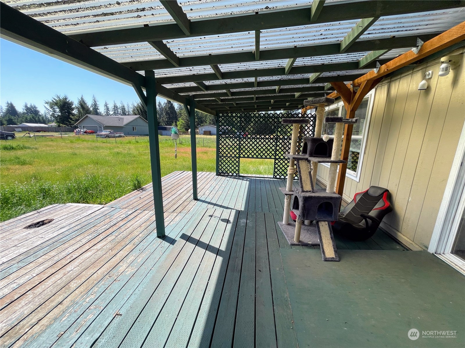 17902 Michelles Lane Southwest Rochester, WA 98579 - Photo 22 of 25 a view of a deck with wooden floor and outer view