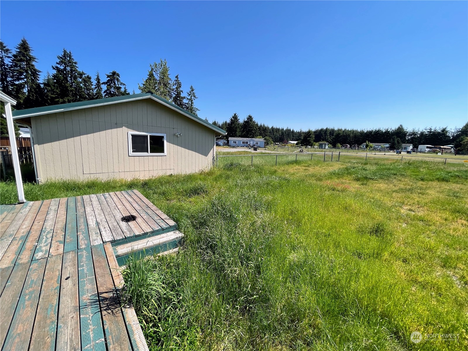 17902 Michelles Lane Southwest Rochester, WA 98579 - Photo 24 of 25 a view of a house with a yard