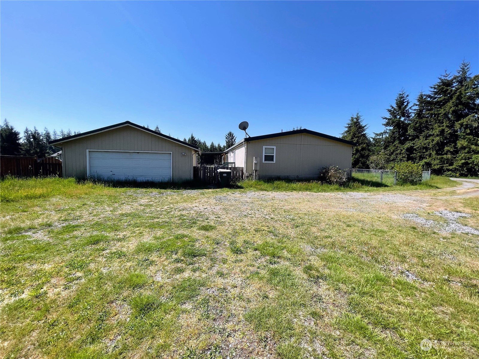 17902 Michelles Lane Southwest Rochester, WA 98579 - Photo 5 of 25 a large house with a big yard