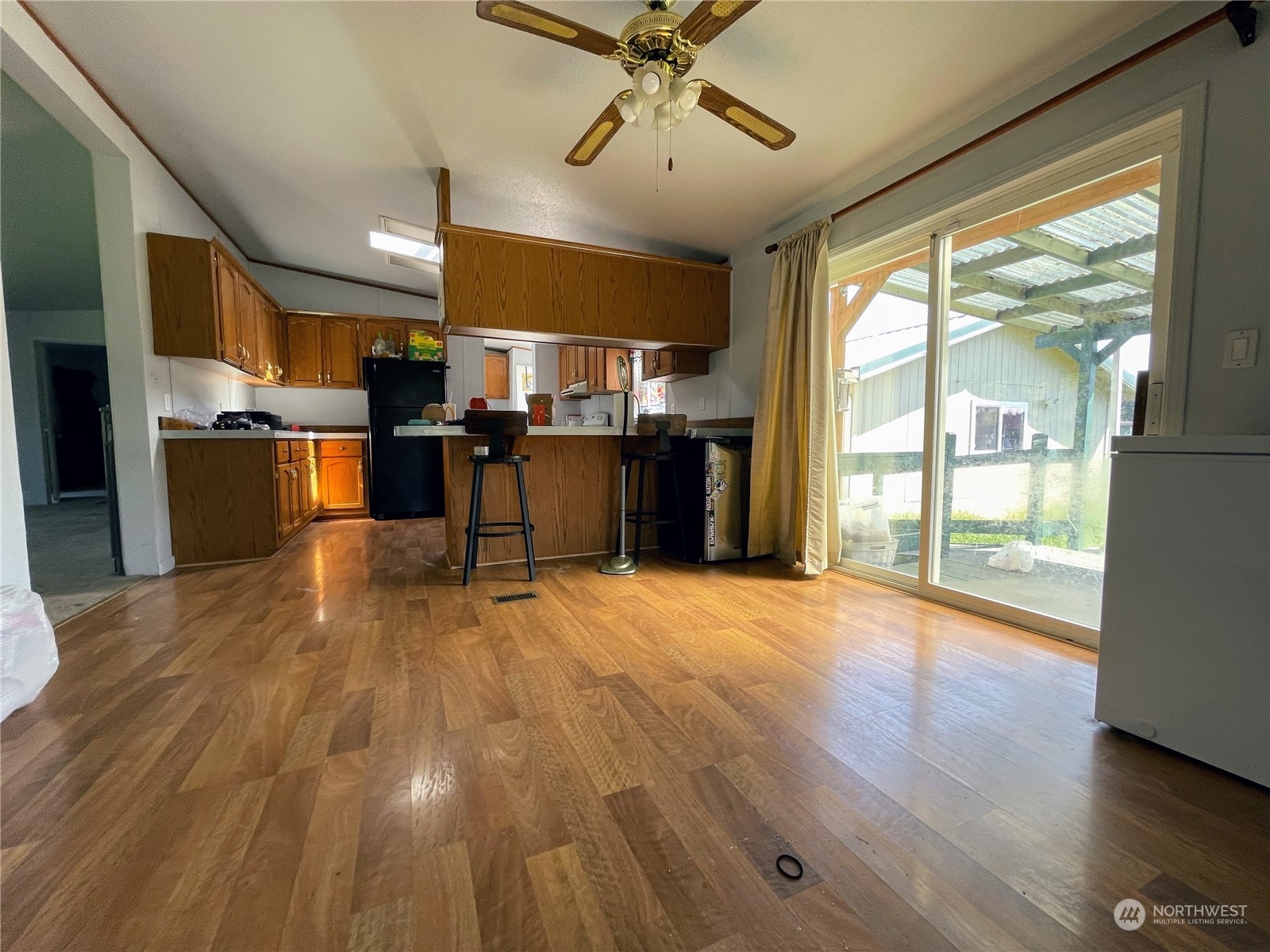 17902 Michelles Lane Southwest Rochester, WA 98579 - Photo 8 of 25 a view of empty room with wooden floor and fan