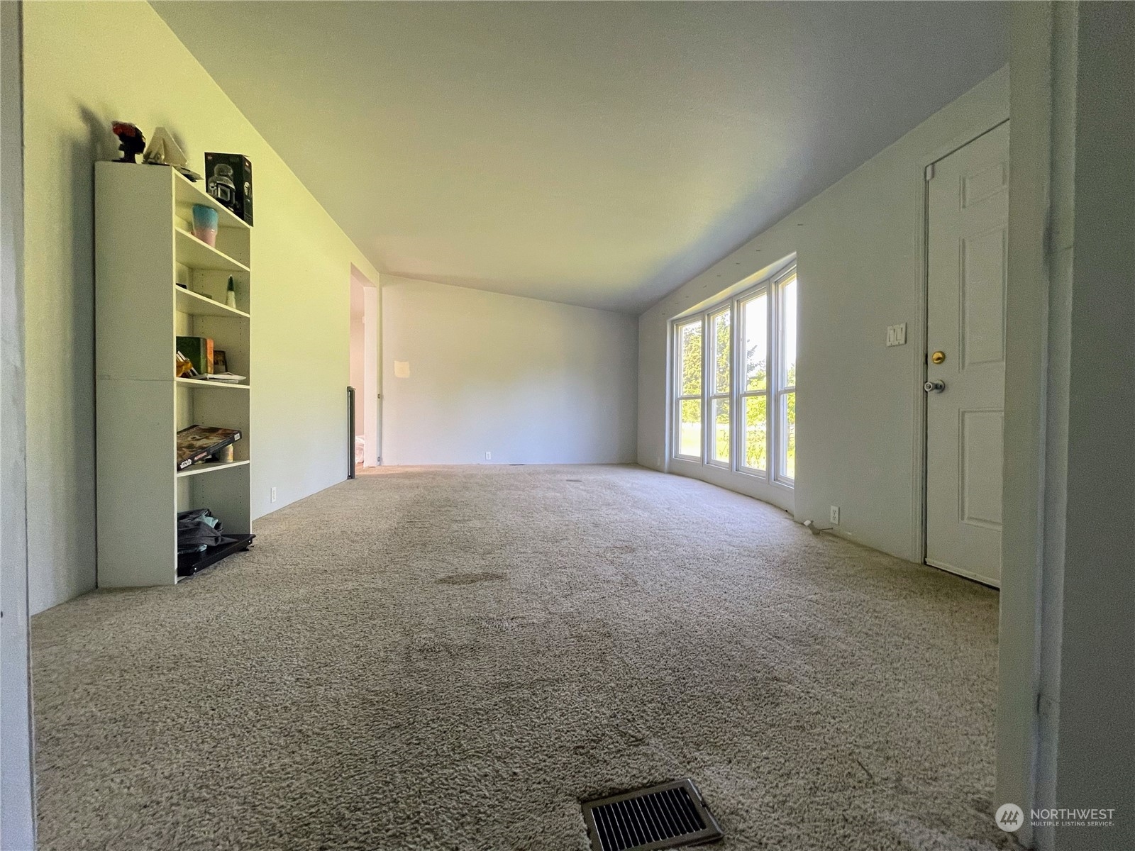 17902 Michelles Lane Southwest Rochester, WA 98579 - Photo 9 of 25 an empty room with windows