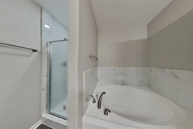 a bathroom with a bathtub