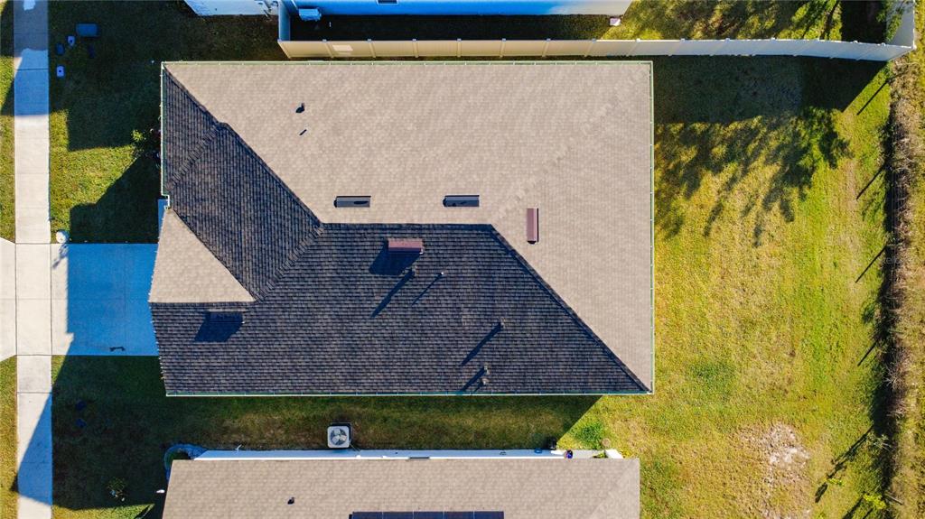 348 Talisi Loop St. Cloud, FL 34771 - Photo 35 of 35 a aerial view of a house with a yard