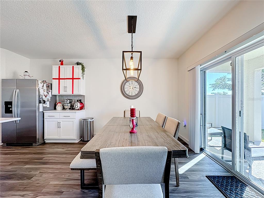 348 Talisi Loop St. Cloud, FL 34771 - Photo 8 of 35 a living room with furniture a rug and a window