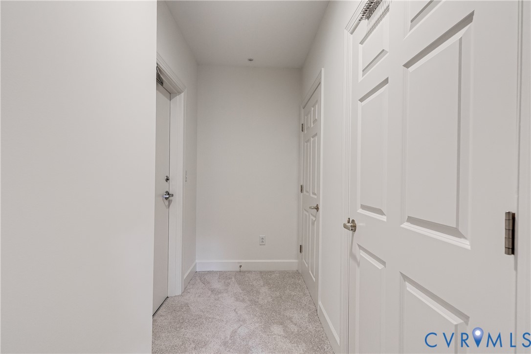413 Stuart Circle, Unit 3D Richmond, VA 23220 - Photo 24 of 26 a view of a hallway