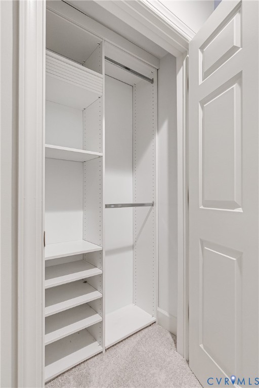 413 Stuart Circle, Unit 3D Richmond, VA 23220 - Photo 25 of 26 a view of walk in closet with empty racks