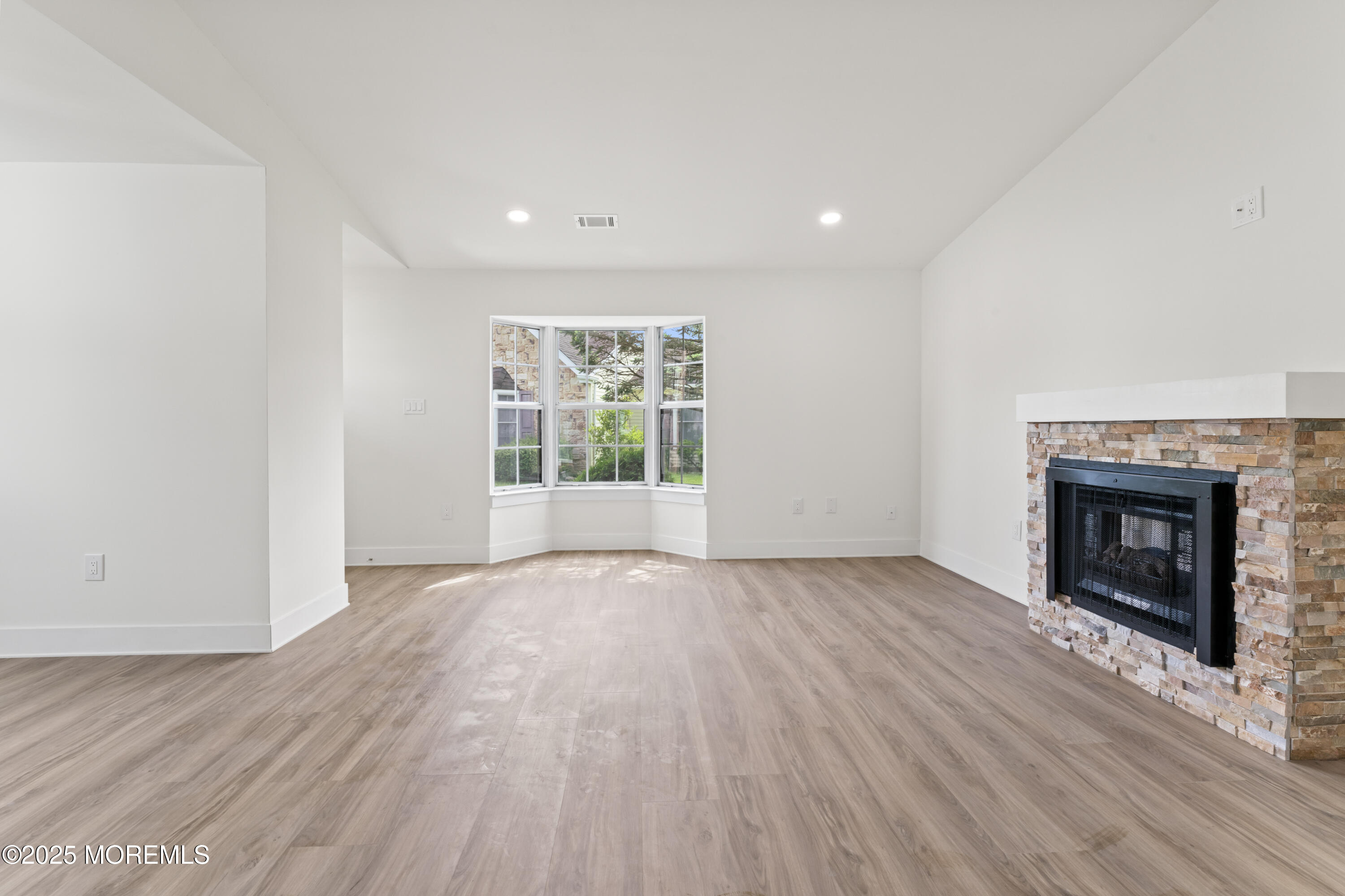 5 Ivy Ridge Close, Unit 1000 Freehold, NJ 07728 - Photo 5 of 23 Living Room w/ Fireplace