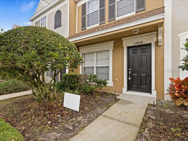 29924 Playa Del Rey Lane Wesley Chapel, FL 33543 - Photo 1 of 31 a view of a house with a yard