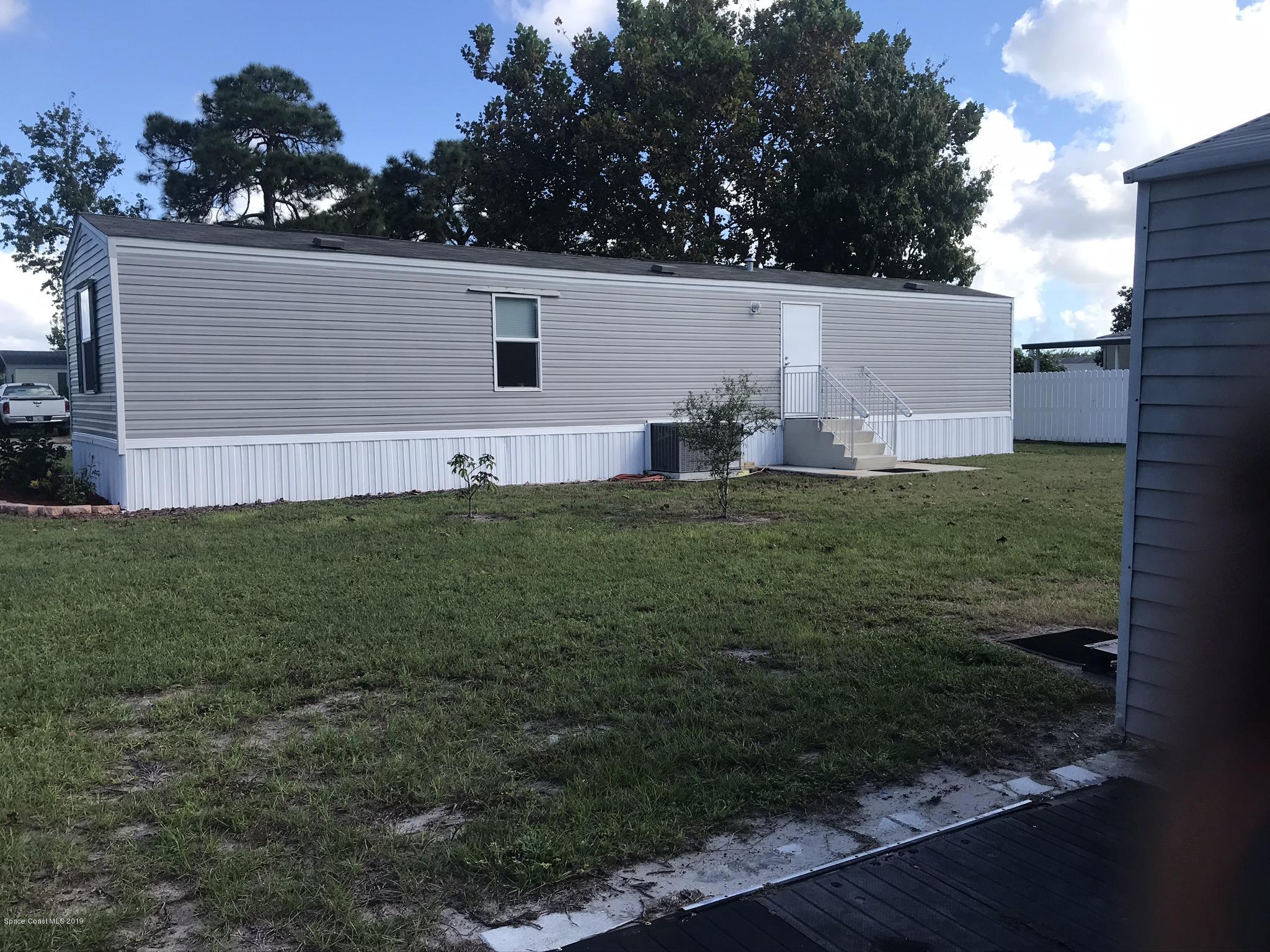 535 Baker Road Merritt Island, FL 32953 - Photo 30 of 34 a view of a backyard