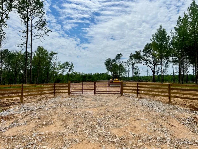 a view of a yard with an outdoor space