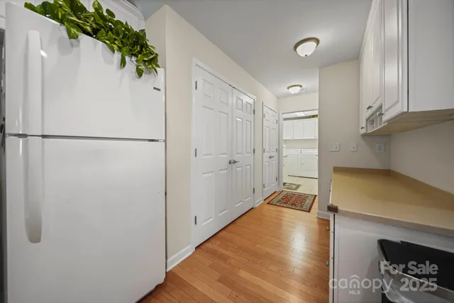 a hallway with wooden floor