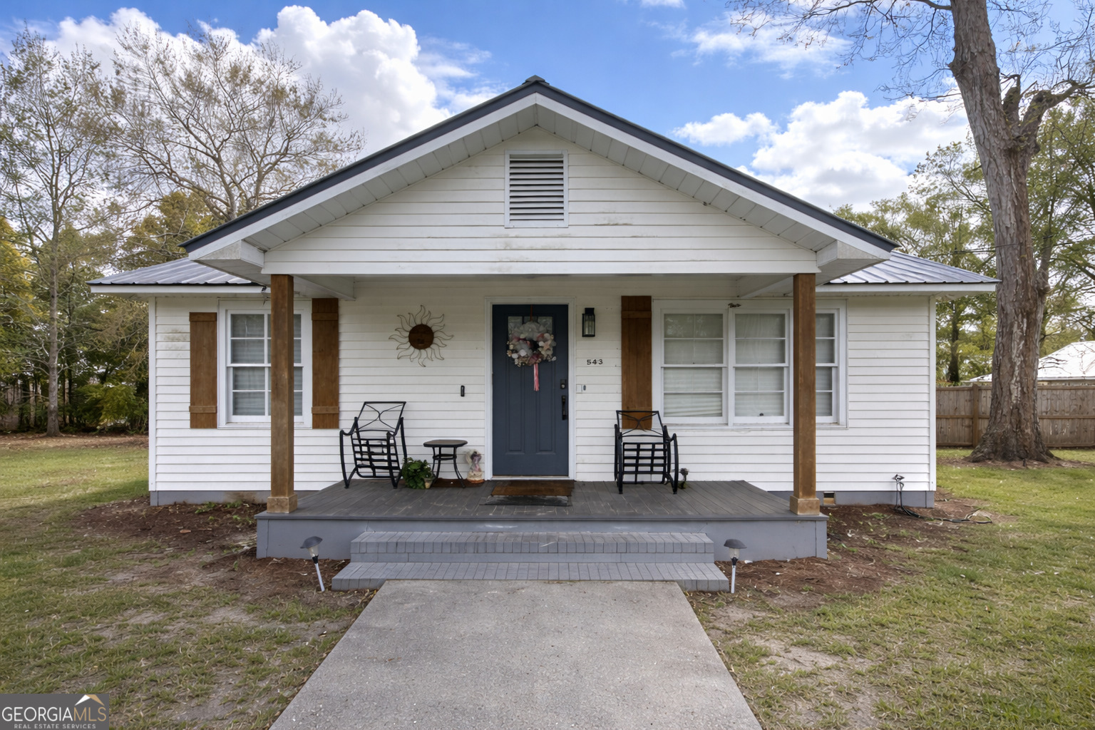 543 Church Street Blackshear, GA 31516 - Photo 1 of 35 a front view of a house with yard