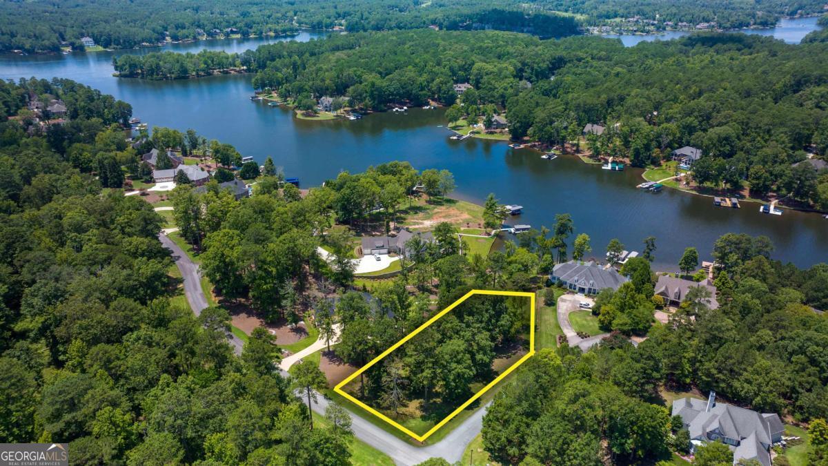 1311 Lighthouse Circle Greensboro, GA 30642 - Photo 2 of 26 an aerial view of a residential houses with outdoor space and lake view