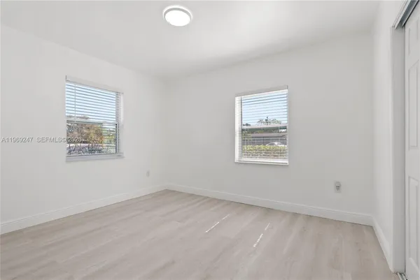an empty room with a window