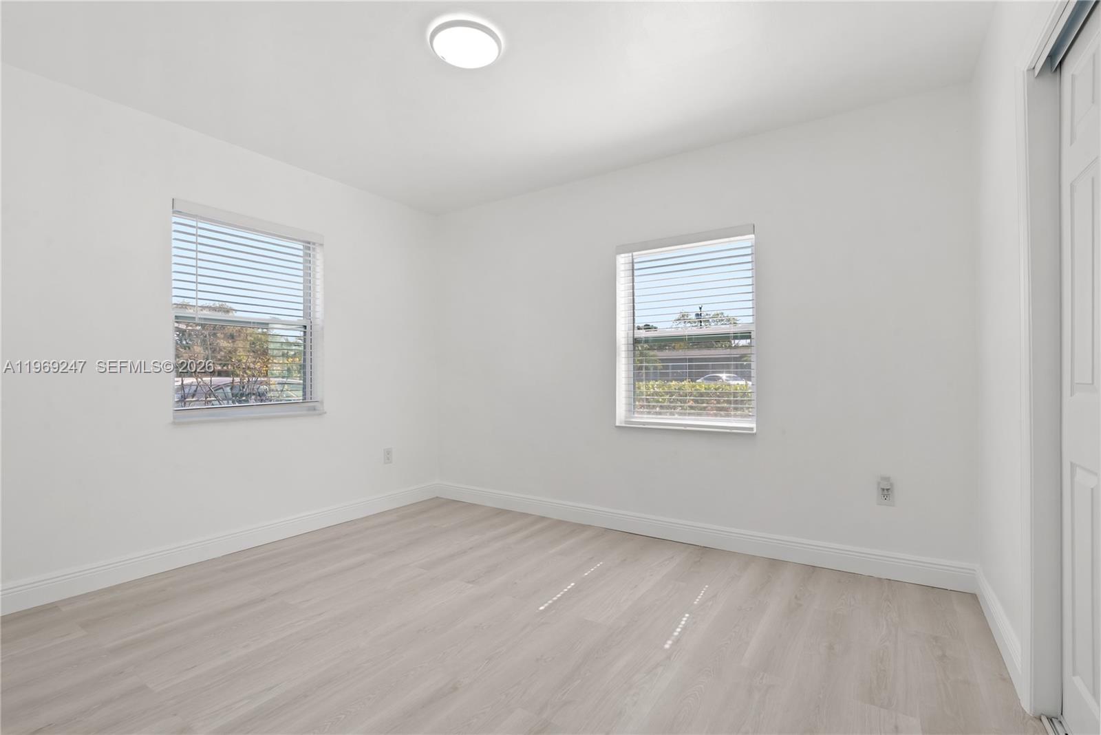 3341 Northwest 7th Street Lauderhill, FL 33311 - Photo 11 of 21 an empty room with a window