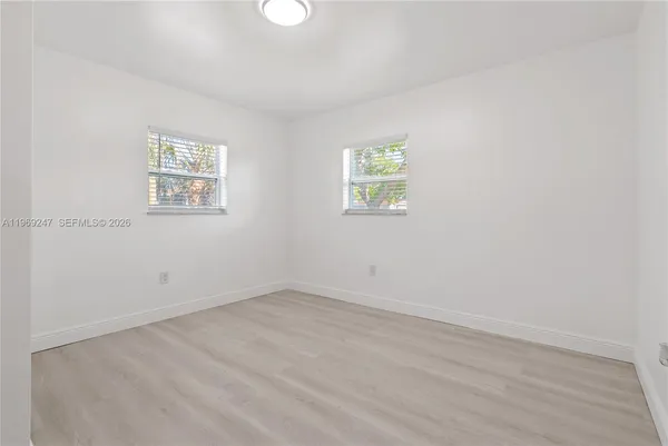 an empty room with a window
