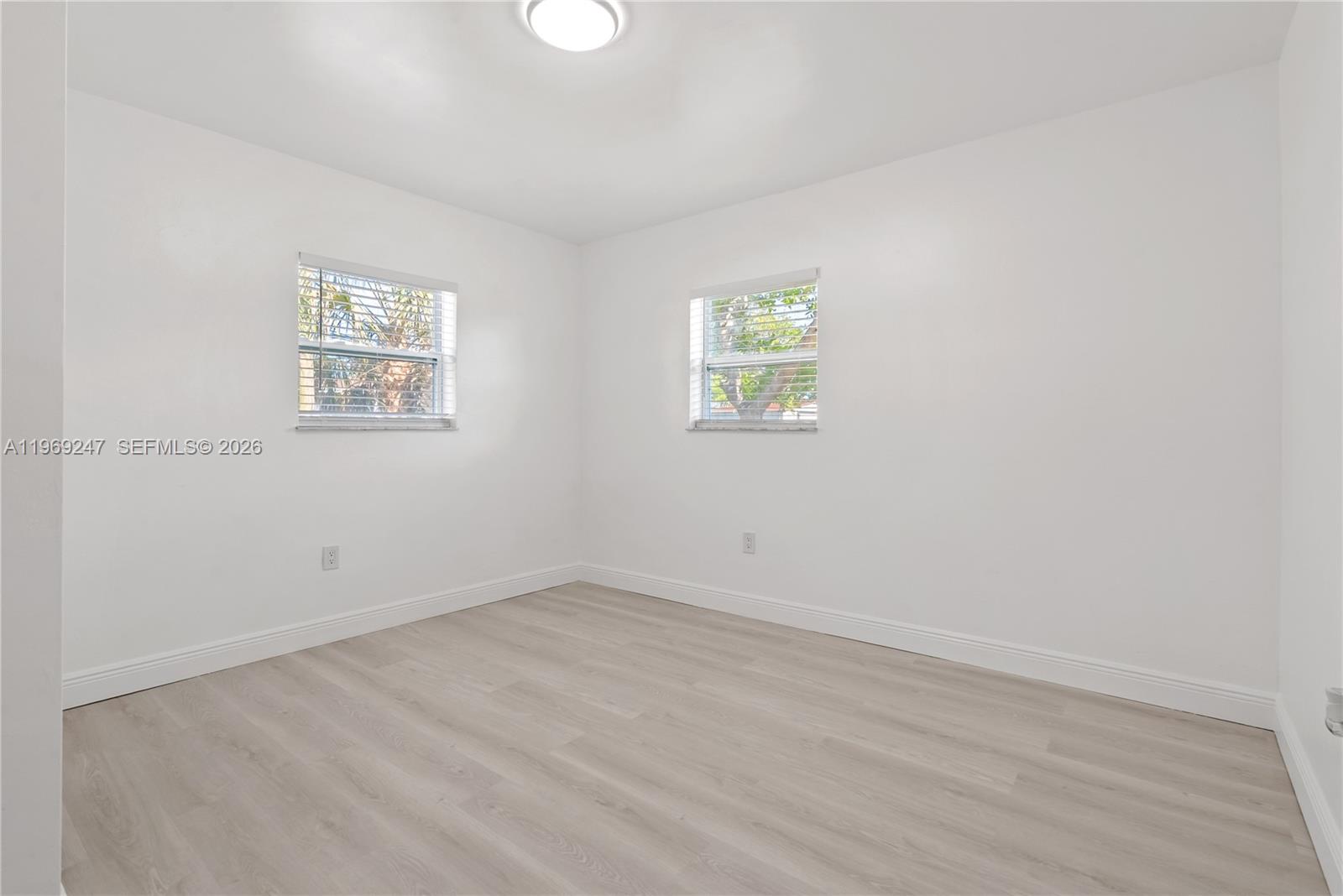 3341 Northwest 7th Street Lauderhill, FL 33311 - Photo 12 of 21 an empty room with a window