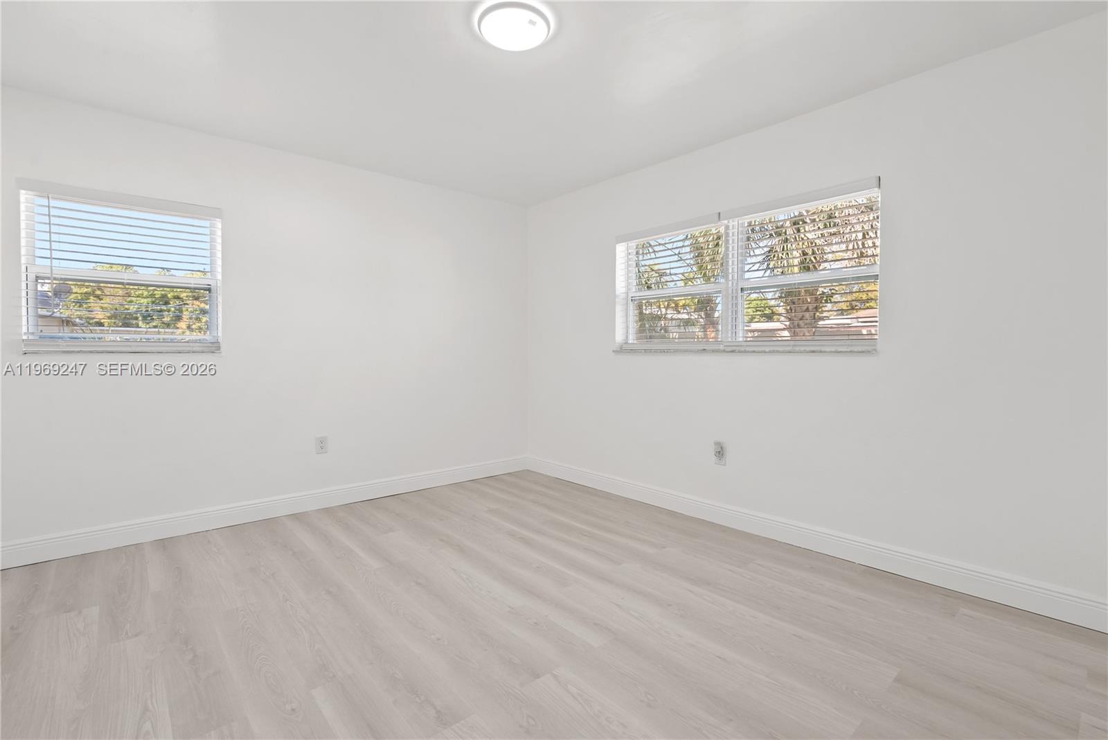 3341 Northwest 7th Street Lauderhill, FL 33311 - Photo 15 of 21 an empty room with a window