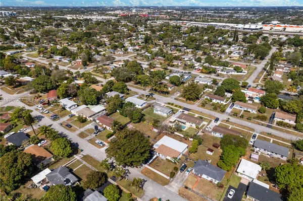 an aerial view of residential building with parking space