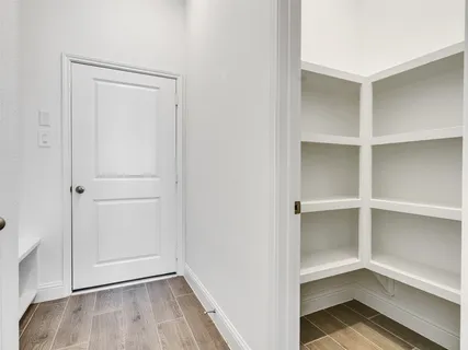 a view of an empty walk in closet