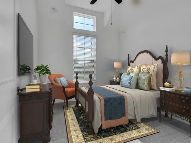 a bedroom with bed and a window